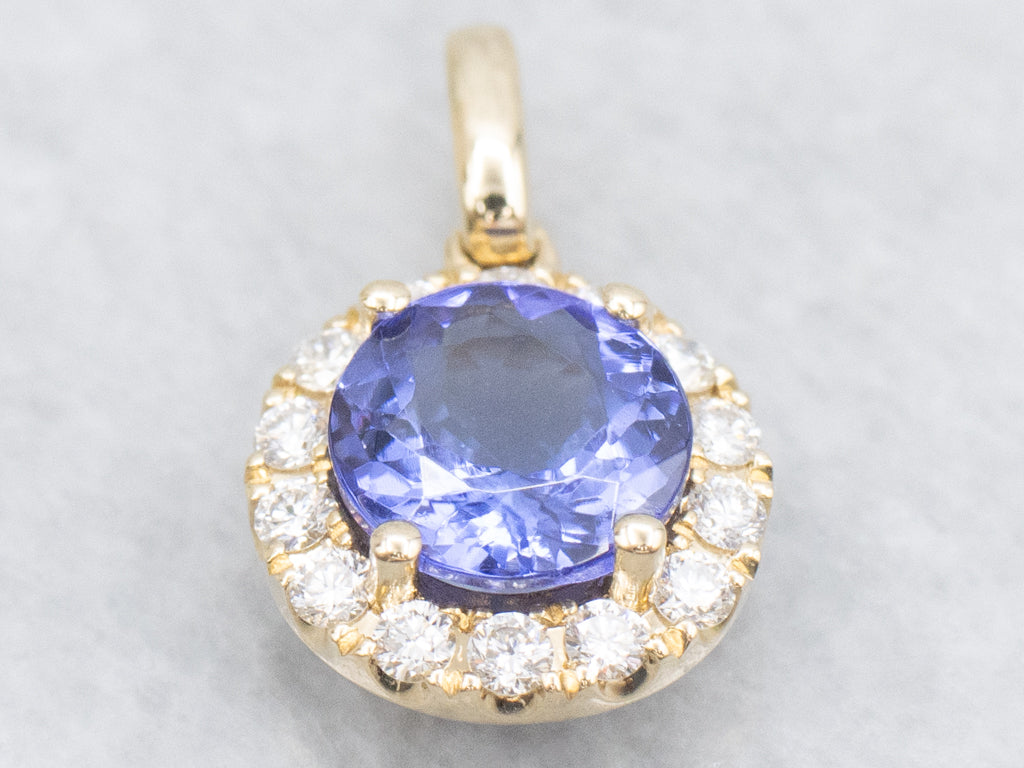 Modern Tanzanite and Diamond Halo Gold Pendant