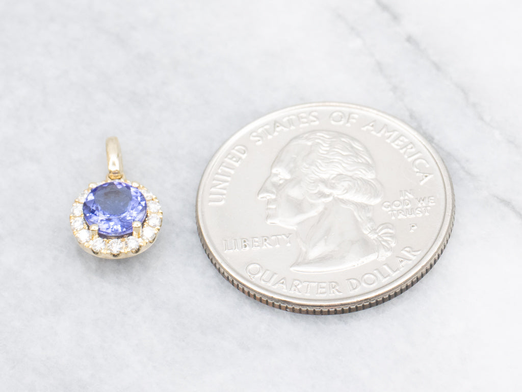 Modern Tanzanite and Diamond Halo Gold Pendant