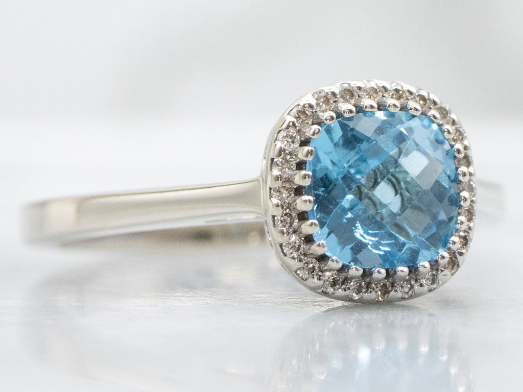 Cushion-Cut Blue Topaz and Diamond Halo Ring