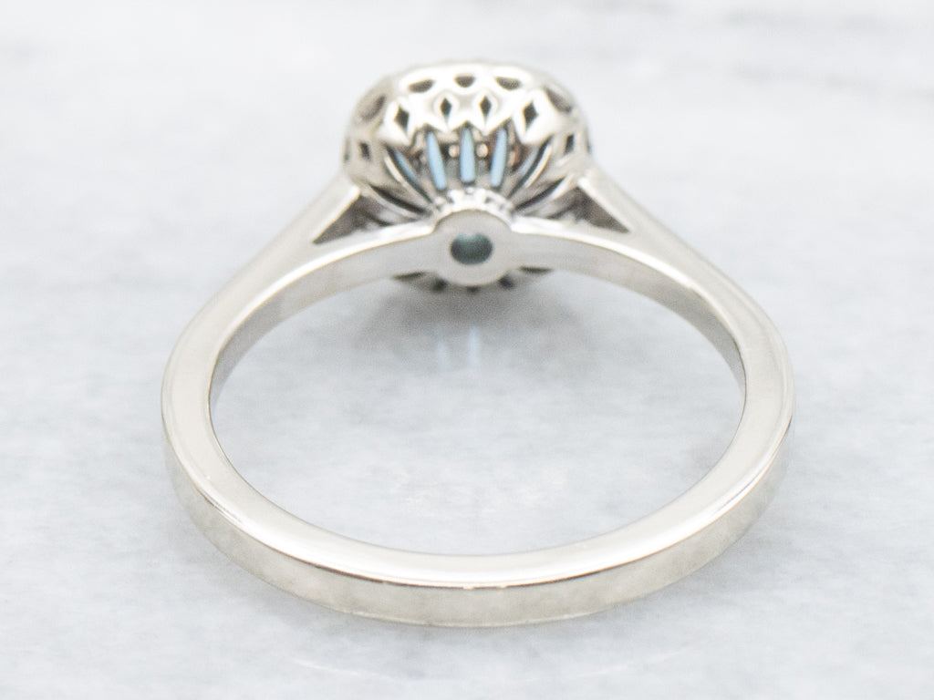 Cushion-Cut Blue Topaz and Diamond Halo Ring