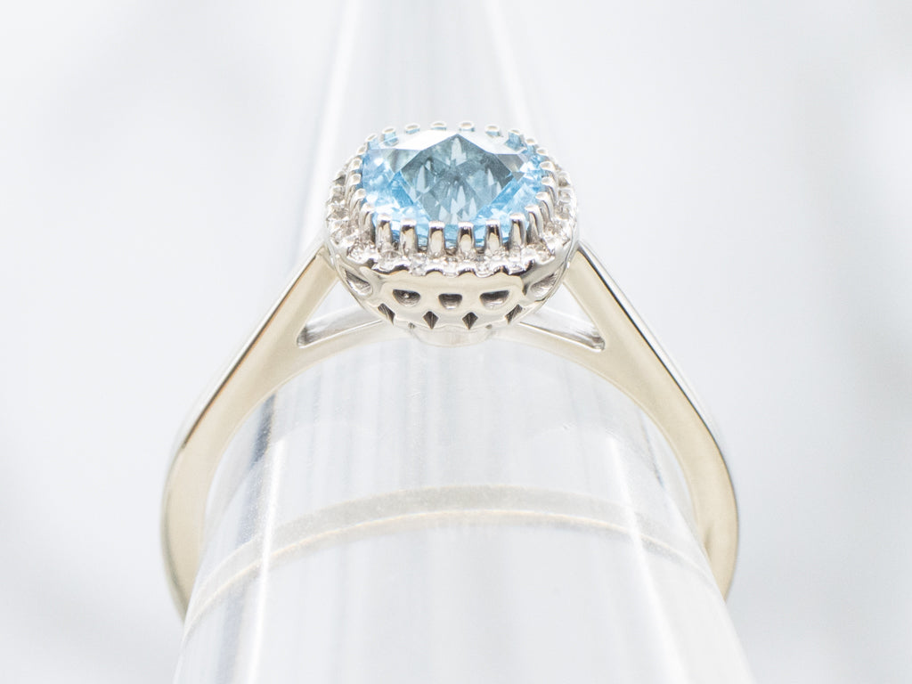 Cushion-Cut Blue Topaz and Diamond Halo Ring