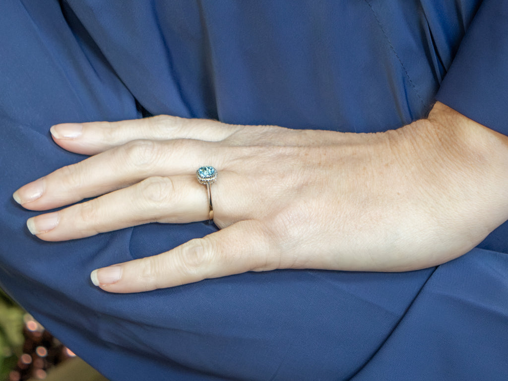 Cushion-Cut Blue Topaz and Diamond Halo Ring