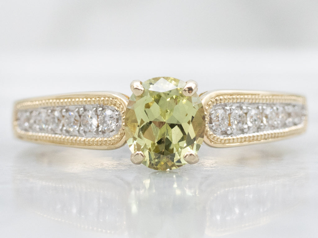 Modern Gold Garnet and Diamond Ring