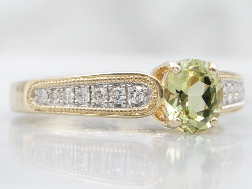 Modern Gold Garnet and Diamond Ring
