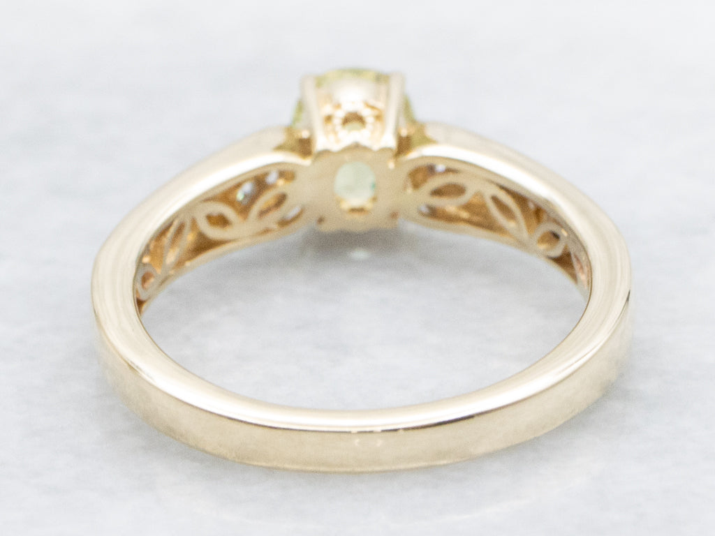 Modern Gold Garnet and Diamond Ring