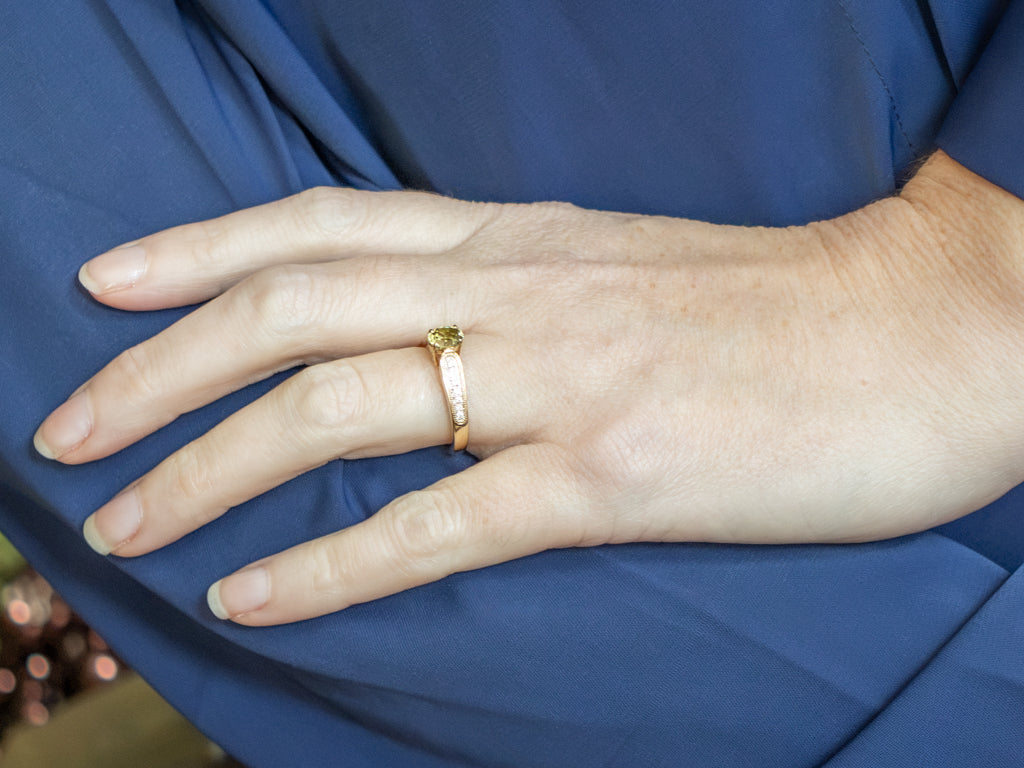Modern Gold Garnet and Diamond Ring