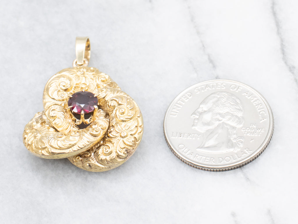 Antique Scrolling Gold and Garnet Lovers Knot Pendant