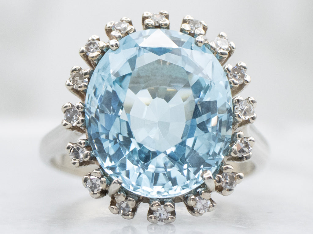 White Gold Topaz and Diamond Halo Ring