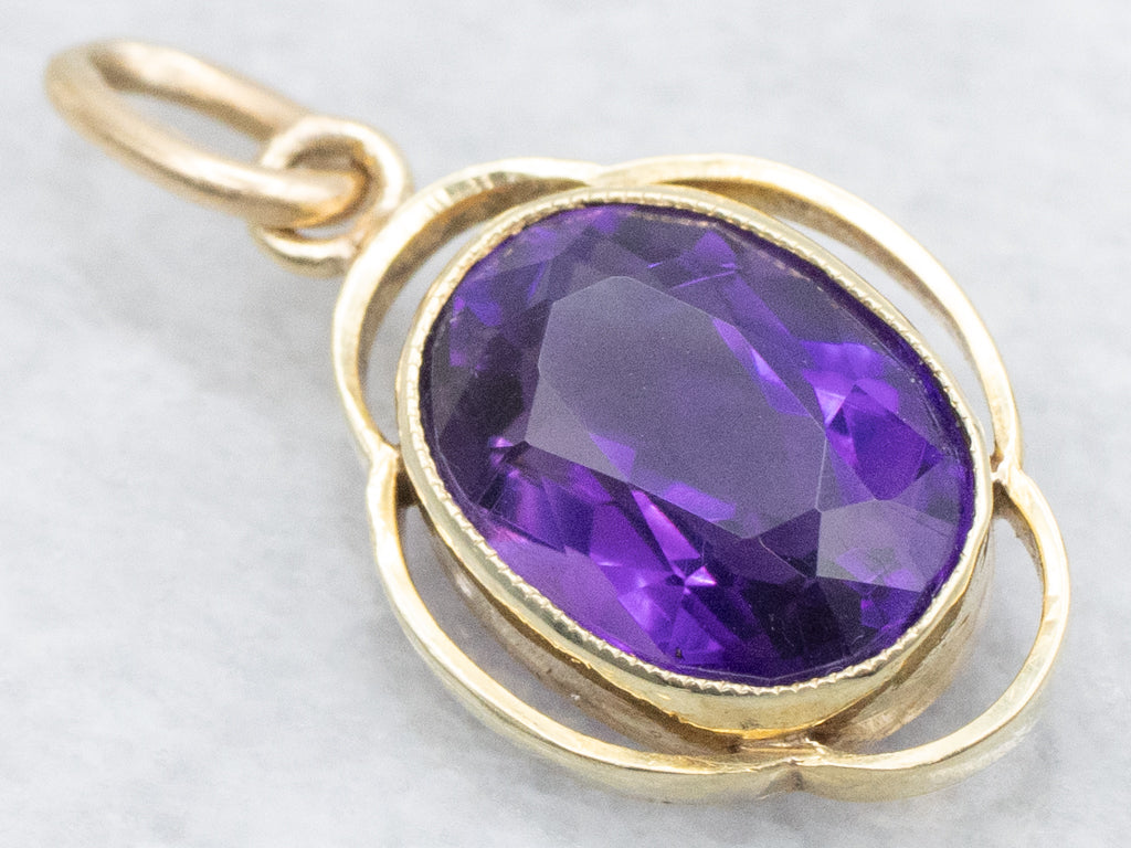 Bezel-Set Amethyst and Gold Pendant