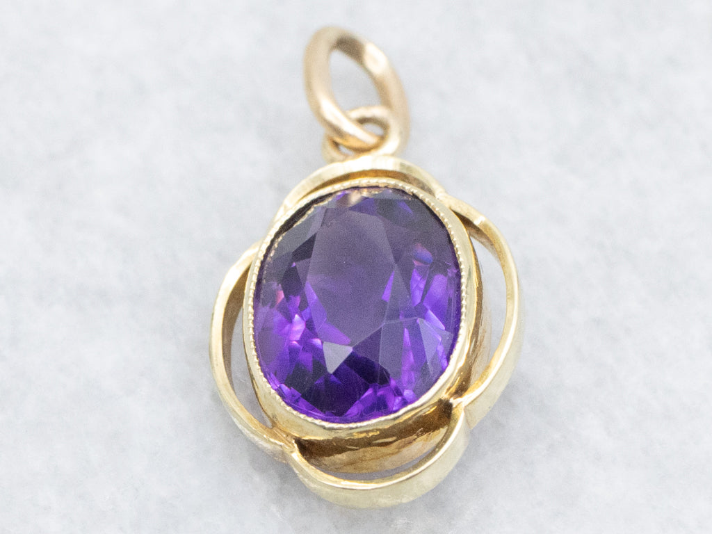 Bezel-Set Amethyst and Gold Pendant