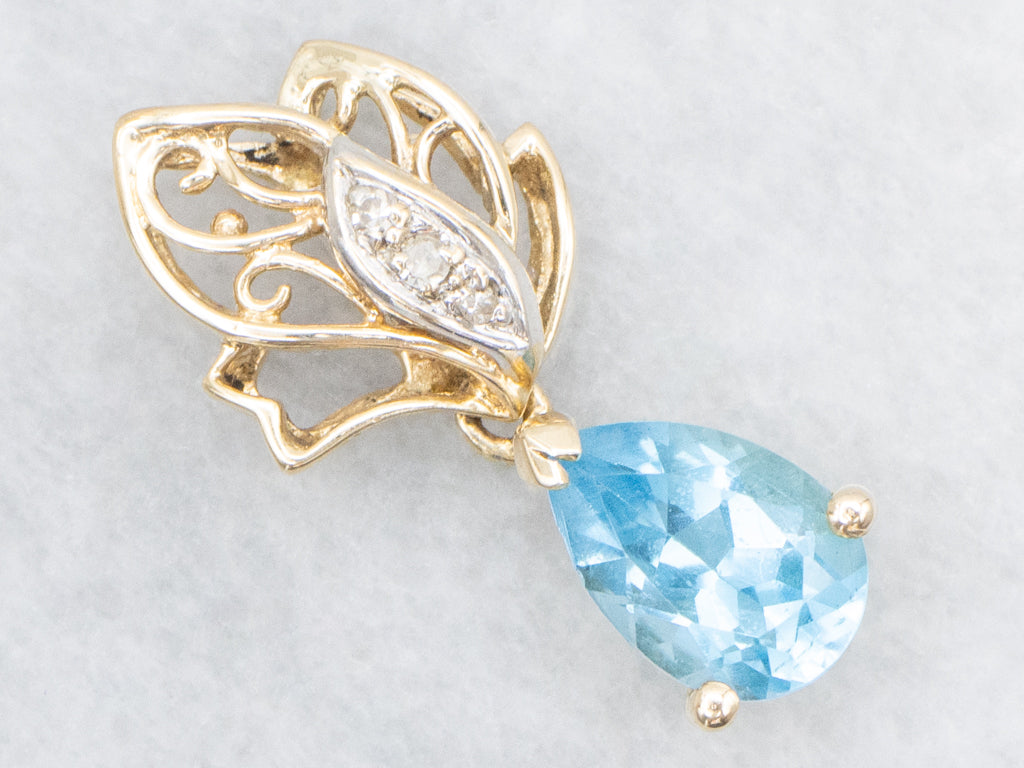 Scrolling Gold Pear-Cut Blue Topaz Pendant with Diamonds