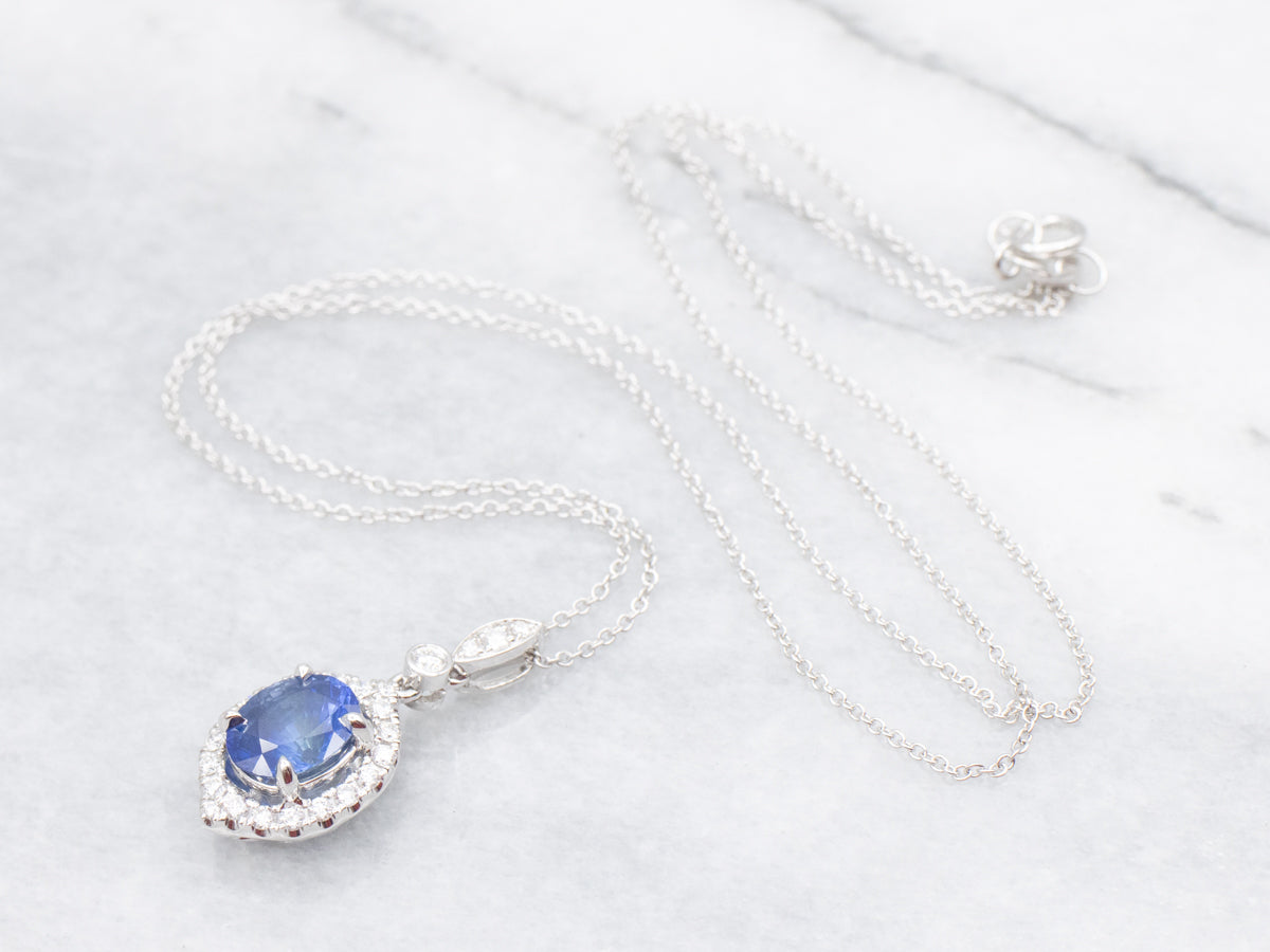 Modern Sapphire and Diamond Halo Pendant Necklace