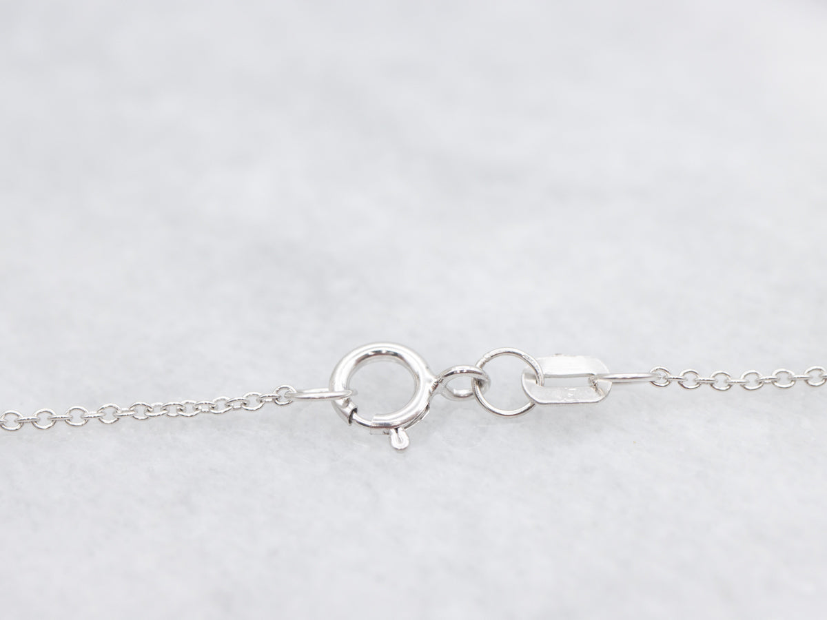 Modern Sapphire and Diamond Halo Pendant Necklace