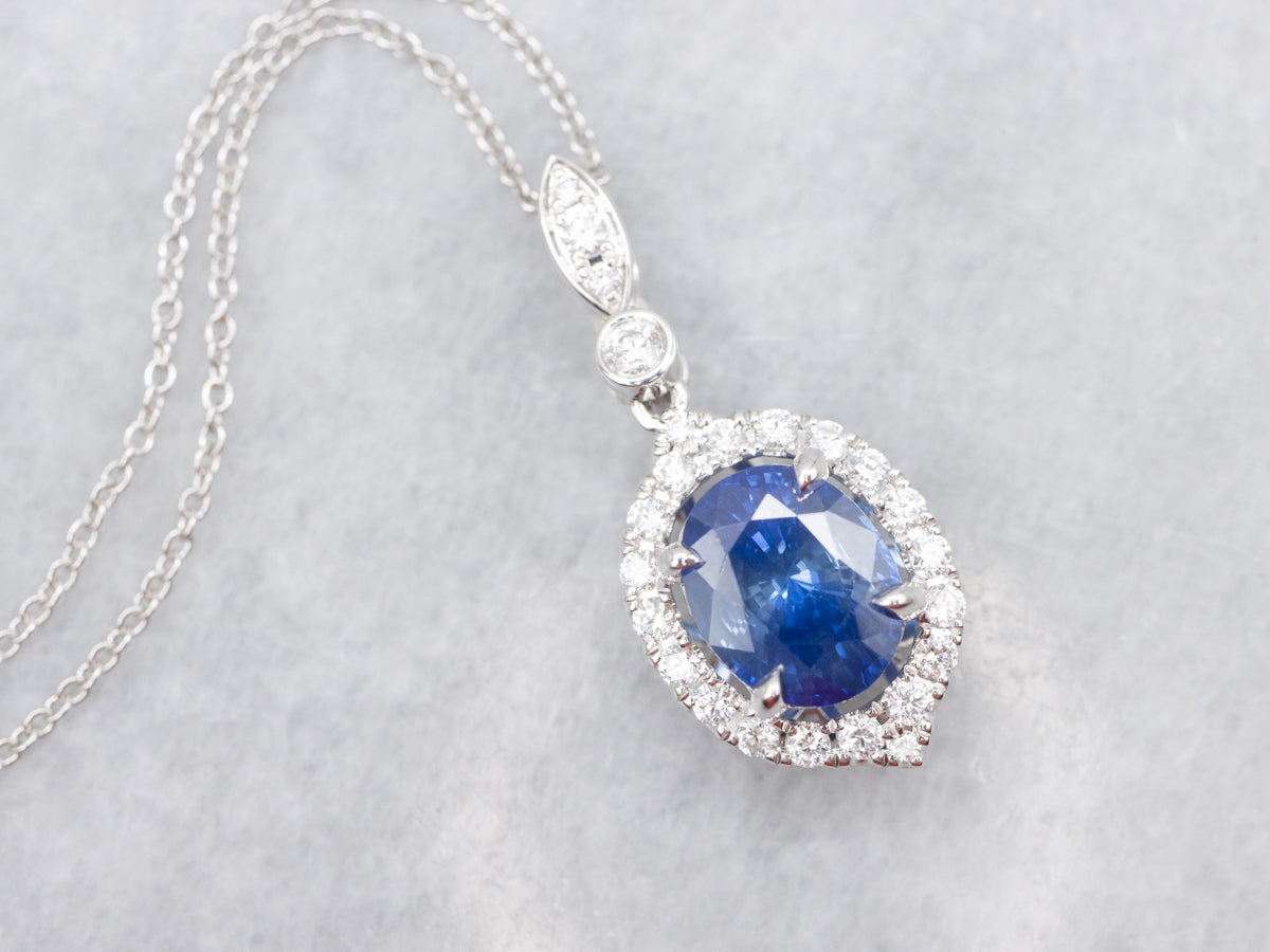 Modern Sapphire and Diamond Halo Pendant Necklace