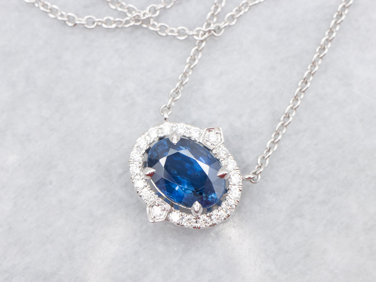 Modern East-to-West Sapphire and Diamond Halo Pendant on Cable Chain