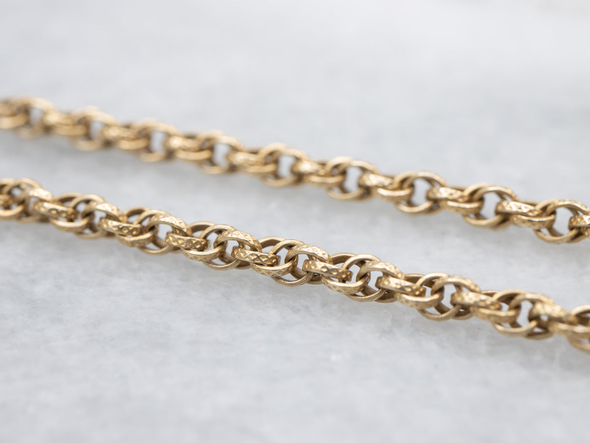 Long Polished Gold Rope Twist Chain