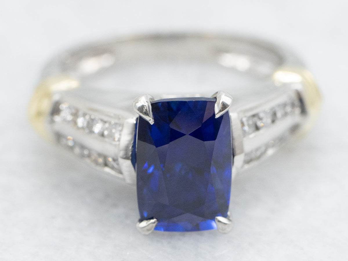 Modern Platinum and Gold Sapphire and Diamond Ring