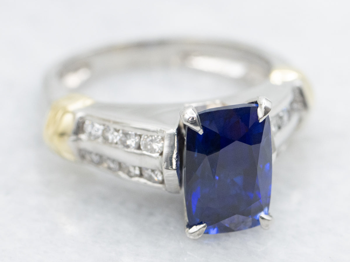 Modern Platinum and Gold Sapphire and Diamond Ring
