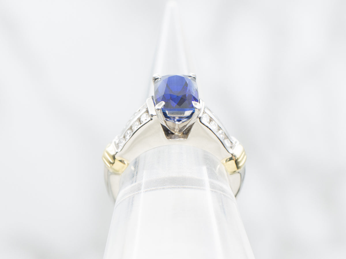 Modern Platinum and Gold Sapphire and Diamond Ring