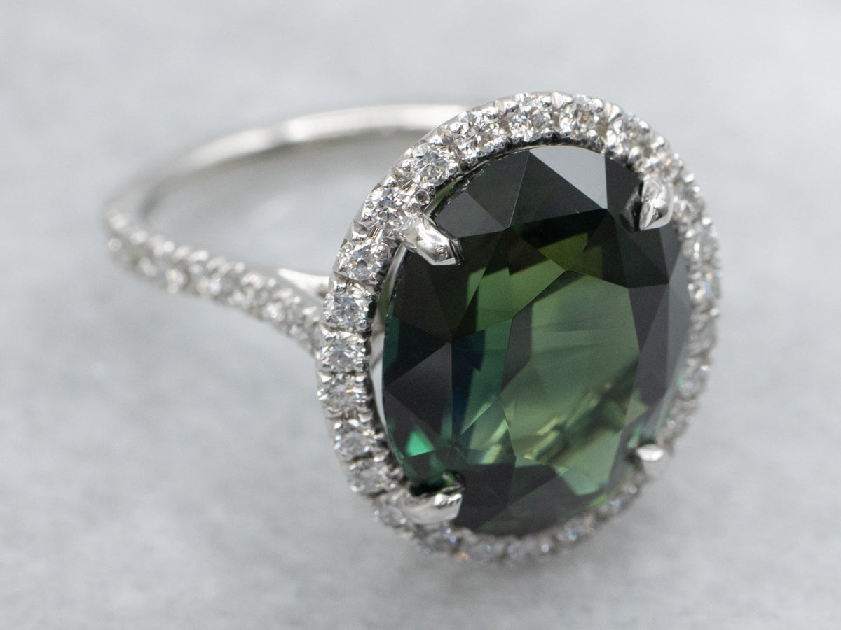 Modern GIA Certified Natural Green Sapphire and Diamond Halo Ring from The Elizabeth Henry Collection