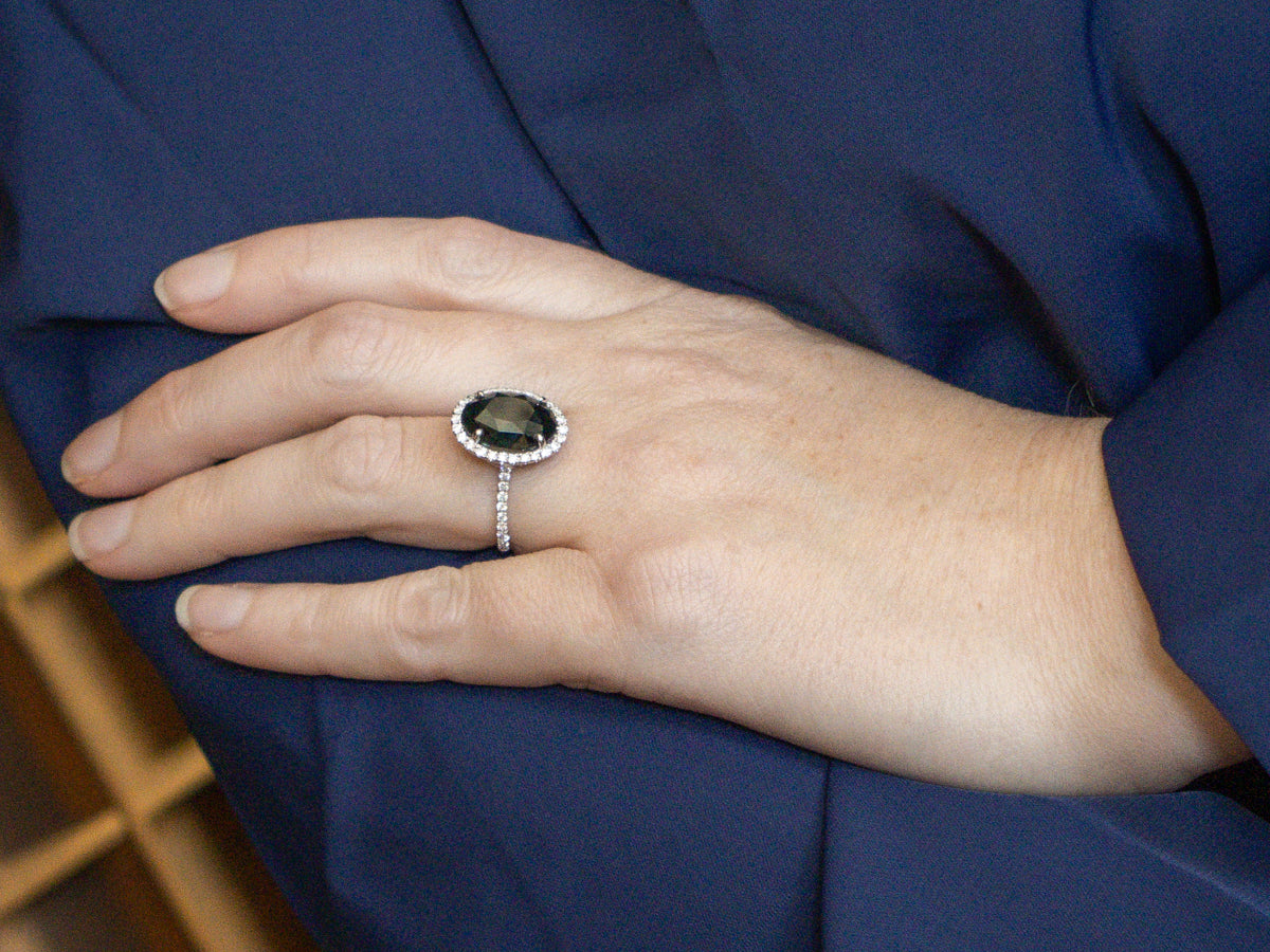 Modern GIA Certified Natural Green Sapphire and Diamond Halo Ring from The Elizabeth Henry Collection