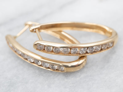 Diamond Oval Hoop Earrings in Gold
