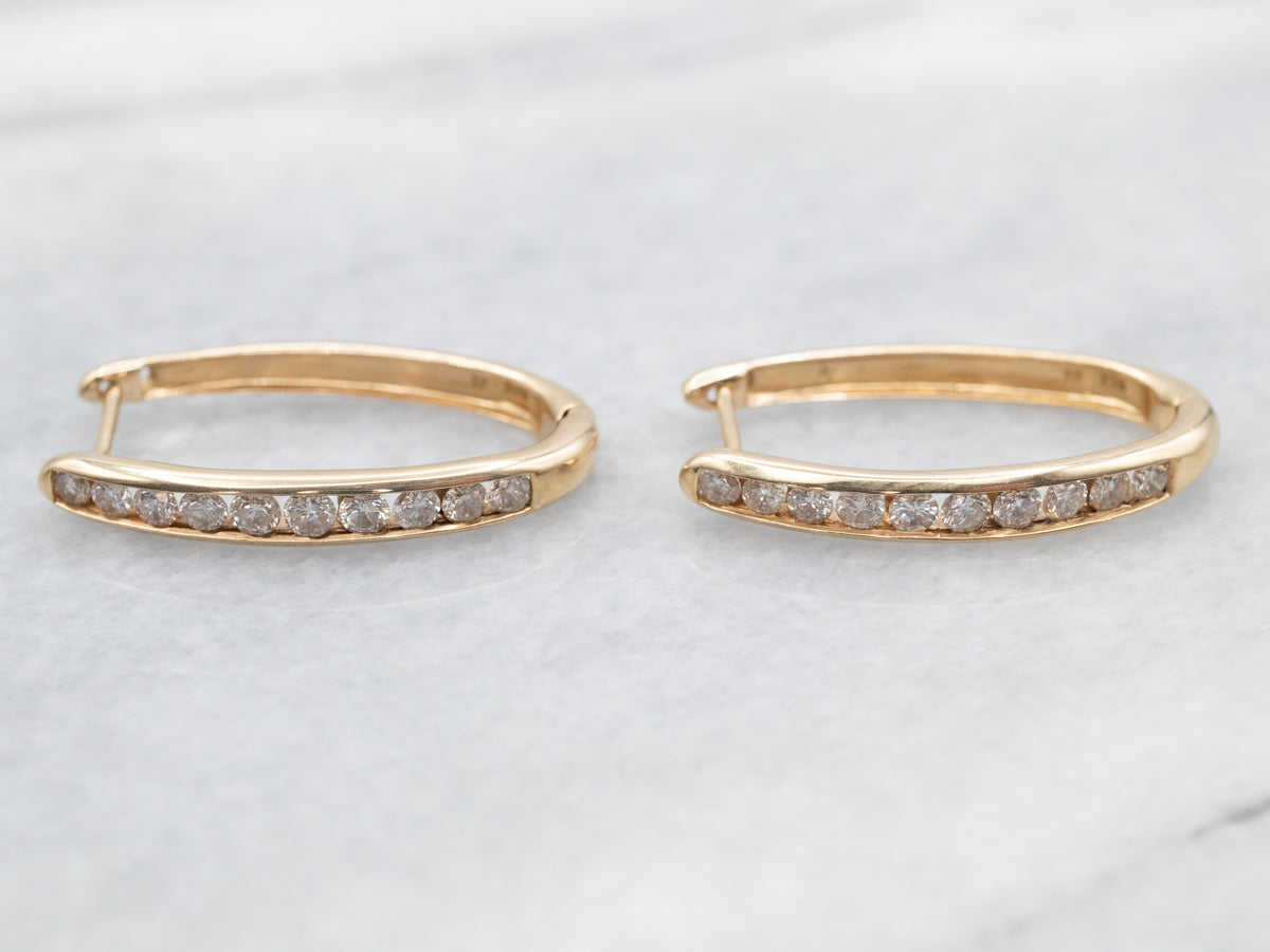 Pendientes de aro ovalados de diamantes en oro