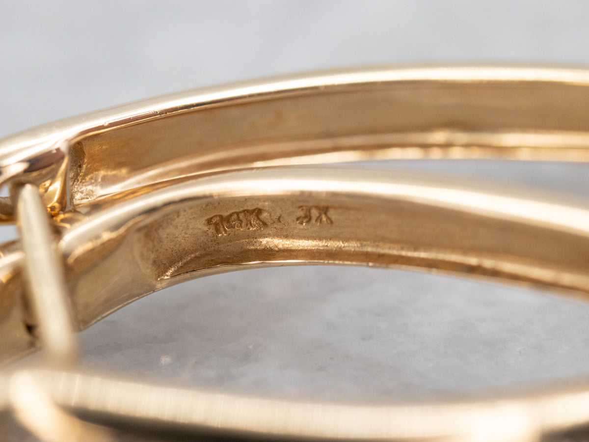 Pendientes de aro ovalados de diamantes en oro