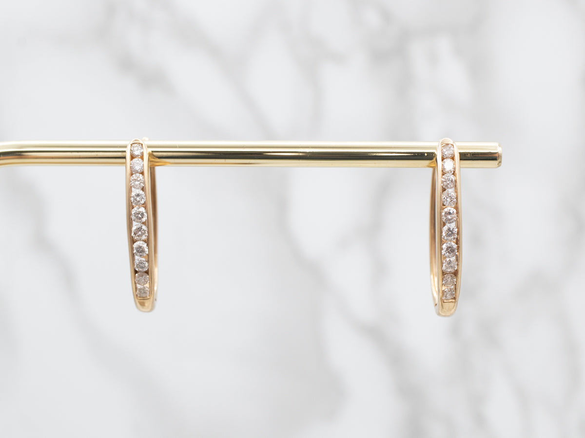 Pendientes de aro ovalados de diamantes en oro