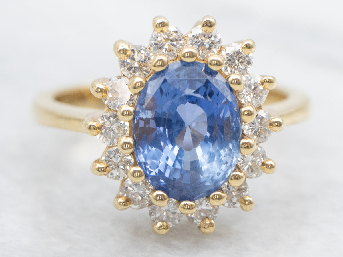 Pretty Blue Sapphire and Diamond Halo Cocktail Ring