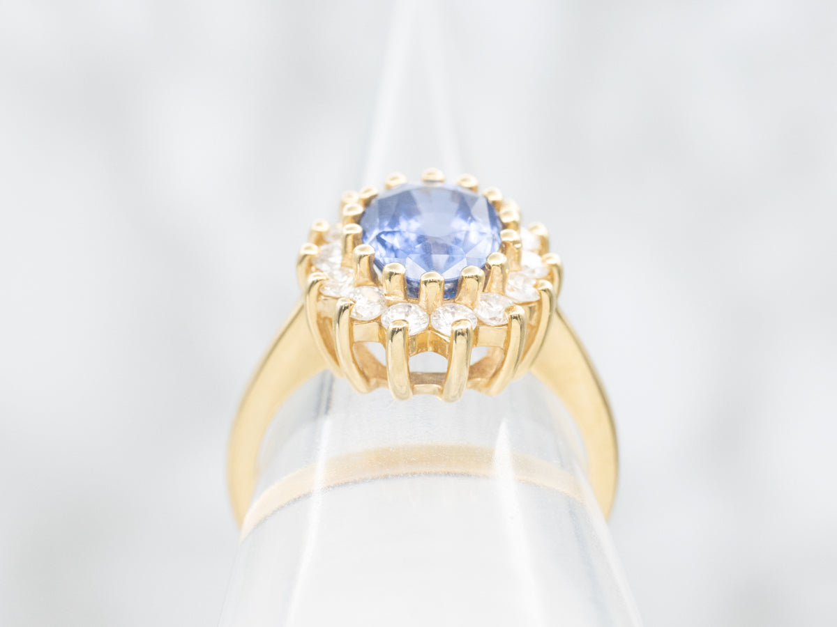 Pretty Blue Sapphire and Diamond Halo Cocktail Ring