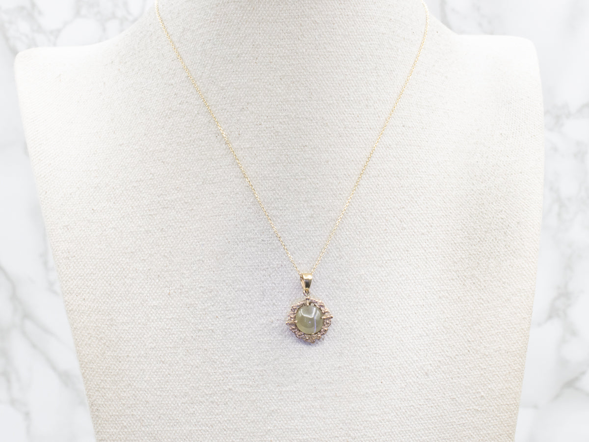 Cat's Eye Sillimanite Pendant in Vintage Mid Century Floral Frame