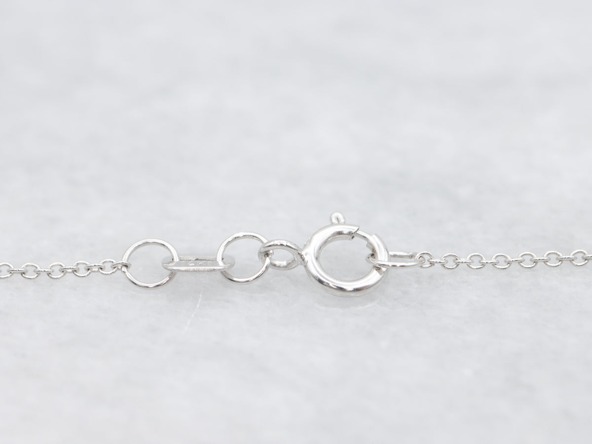 Modern Sapphire and Diamond Halo Pendant Necklace