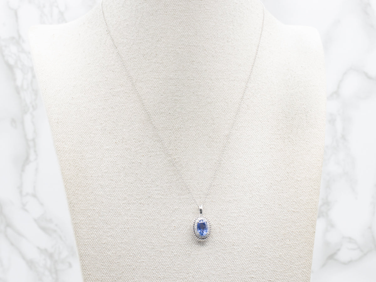 Modern Sapphire and Diamond Halo Pendant Necklace