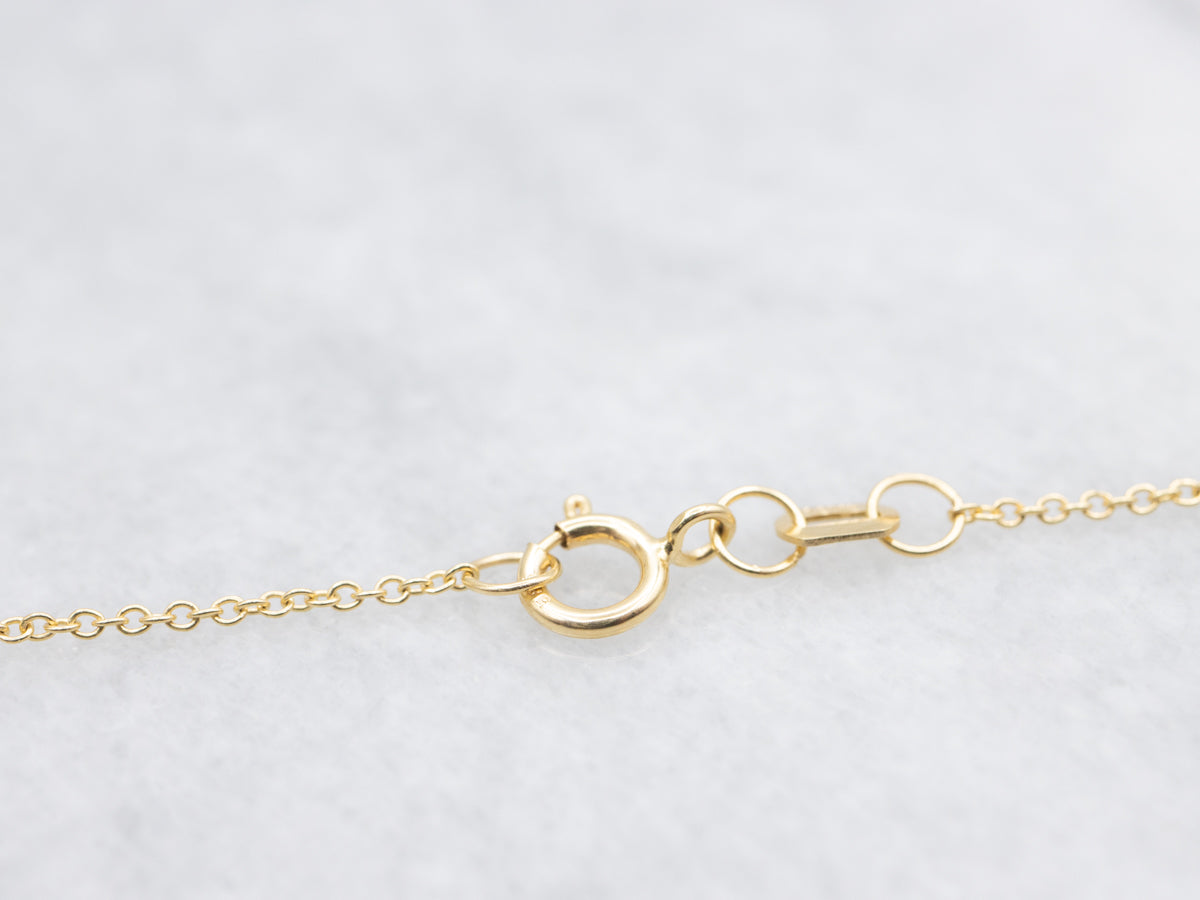 Modern Sapphire and Diamond Halo Pendant Necklace