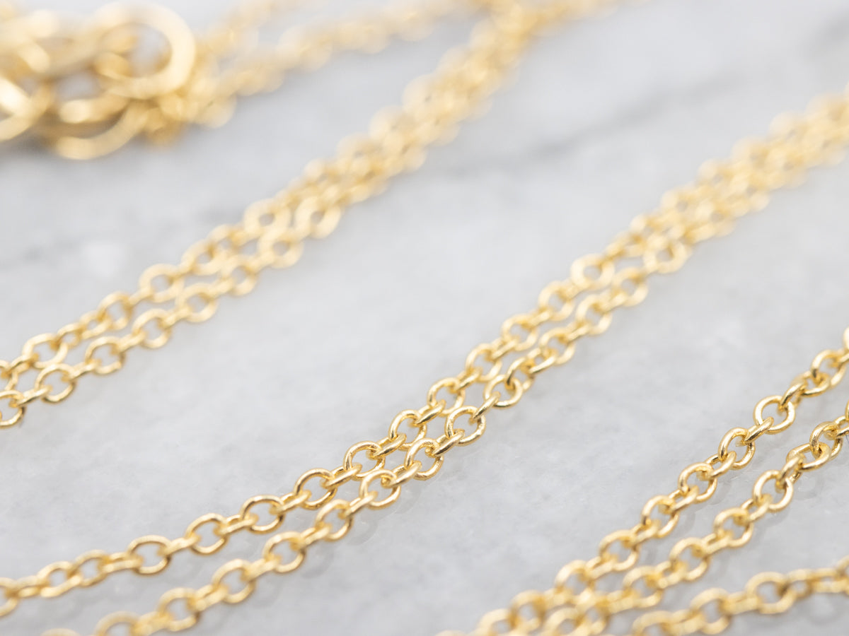 Modern Sapphire and Diamond Halo Pendant Necklace