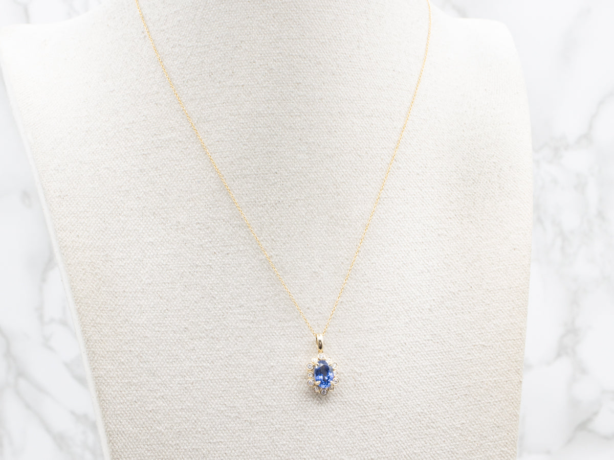 Modern Sapphire and Diamond Halo Pendant Necklace