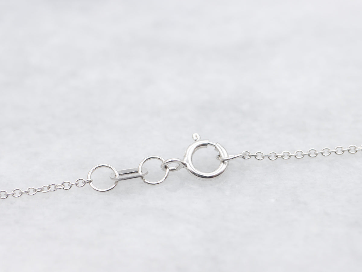 Modern Sapphire and Diamond Halo Pendant Necklace