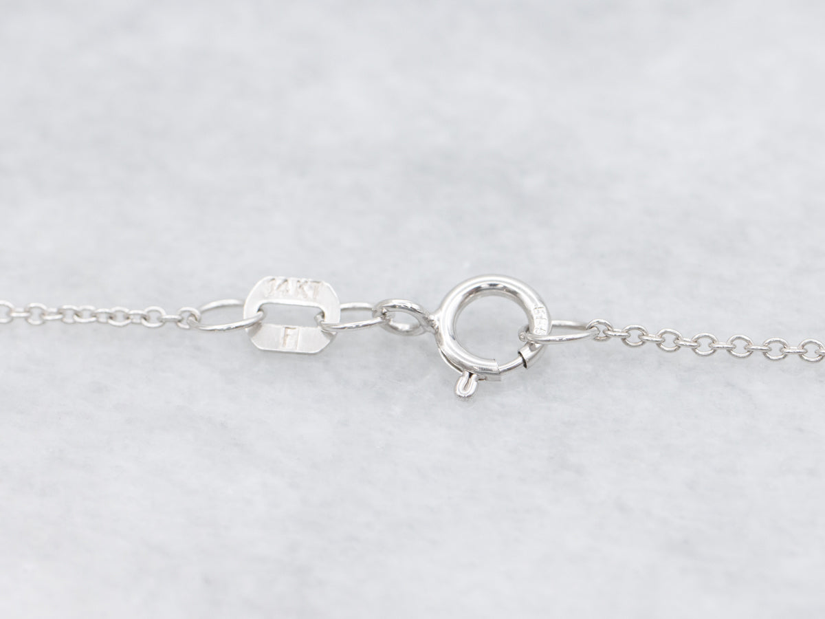 Modern Pear-Cut Sapphire and Diamond Halo Pendant Necklace