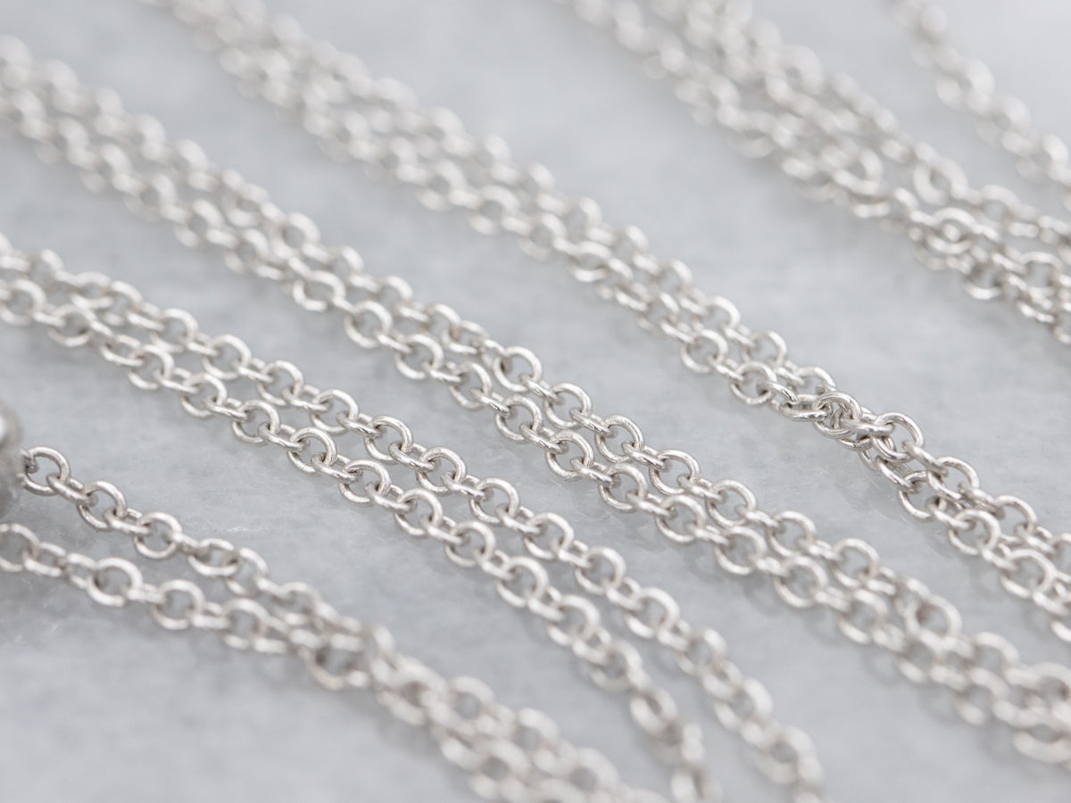 Modern Pear-Cut Sapphire and Diamond Halo Pendant Necklace