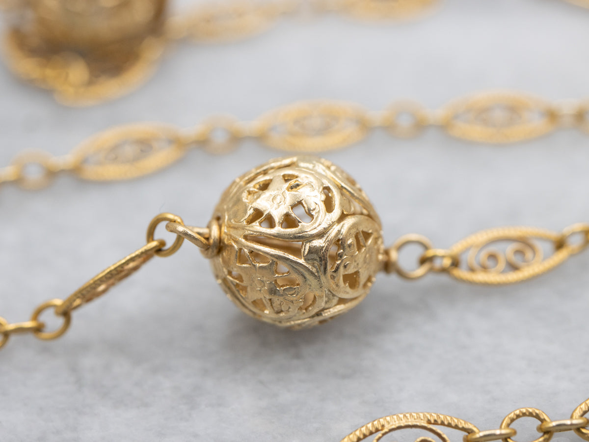 Collar de cadena de orbe de filigrana vintage continua de oro amarillo de 14 quilates