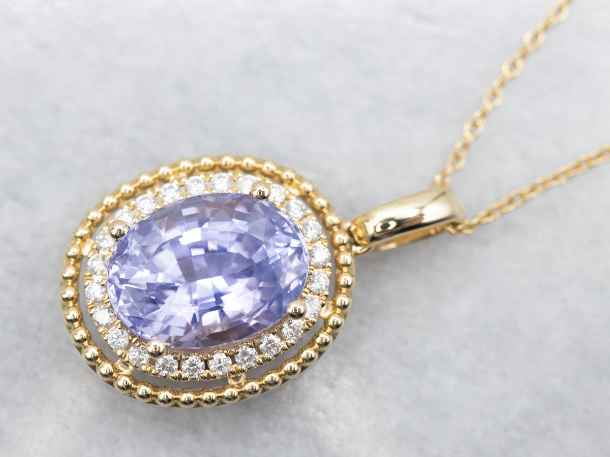 Modern Gold Sapphire Halo Pendant Necklace