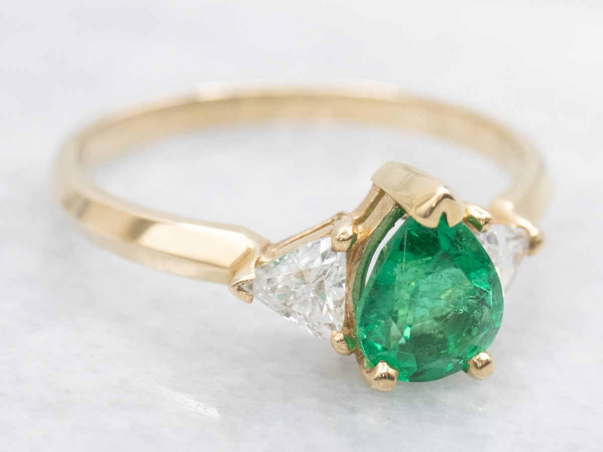 Modern Emerald and Trillion Cut Diamond Accent Ring