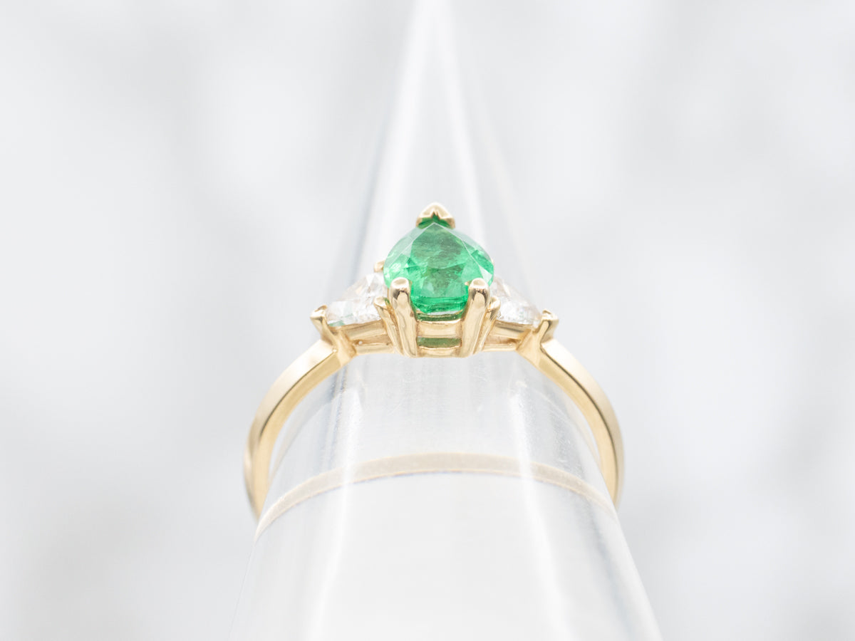 Modern Emerald and Trillion Cut Diamond Accent Ring