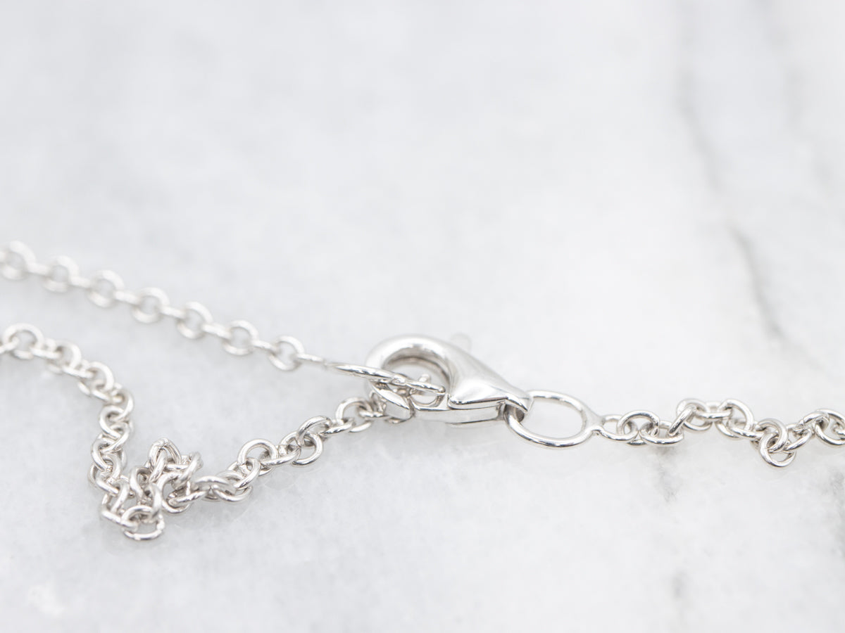 Modern Pink Tourmaline and Diamond Halo Pendant Necklace