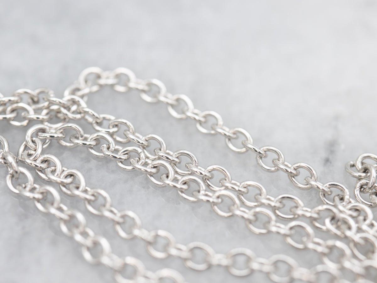 Modern Pink Tourmaline and Diamond Halo Pendant Necklace