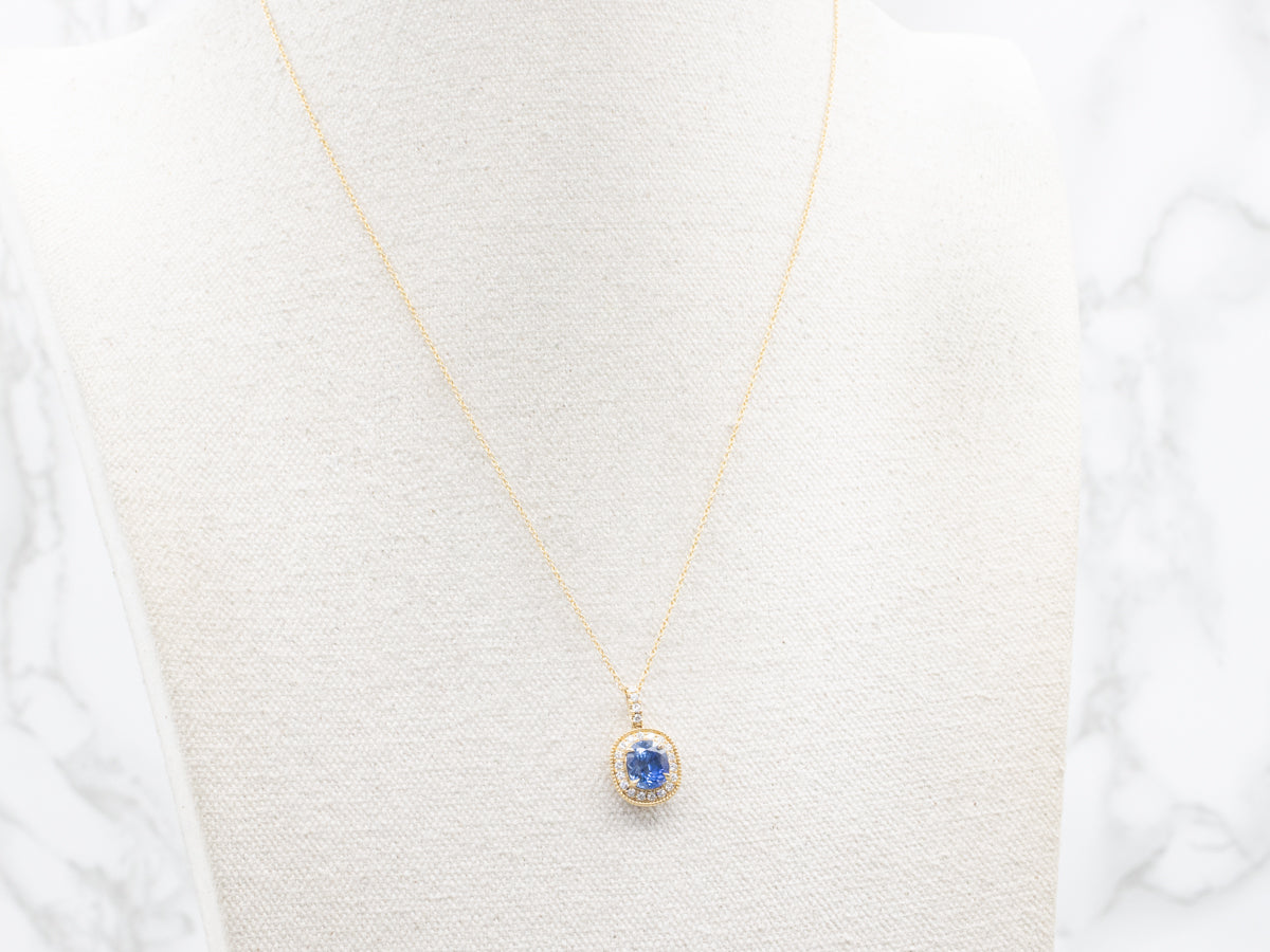 Modern Sapphire and Diamond Halo Pendant on Cable Chain