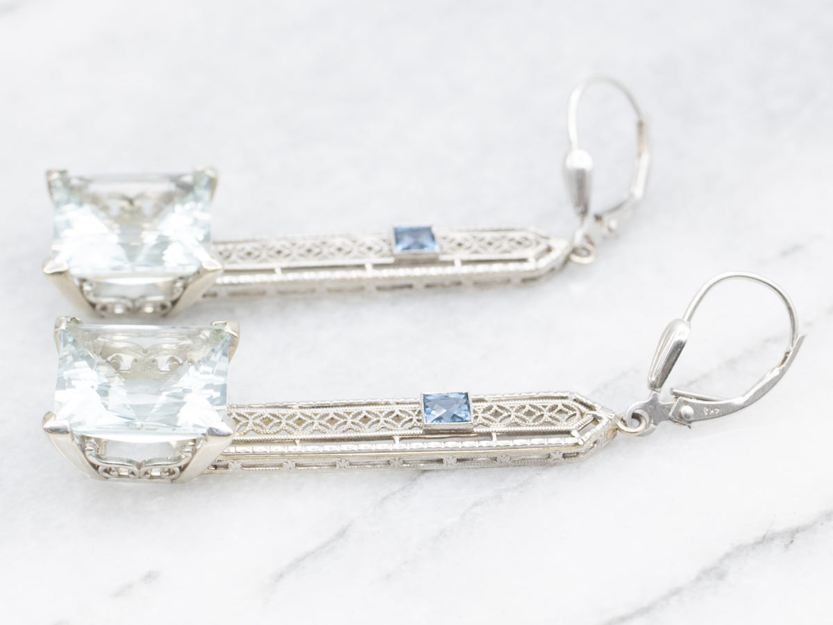 Pendientes colgantes de aguamarina en oro blanco con detalles de zafiro