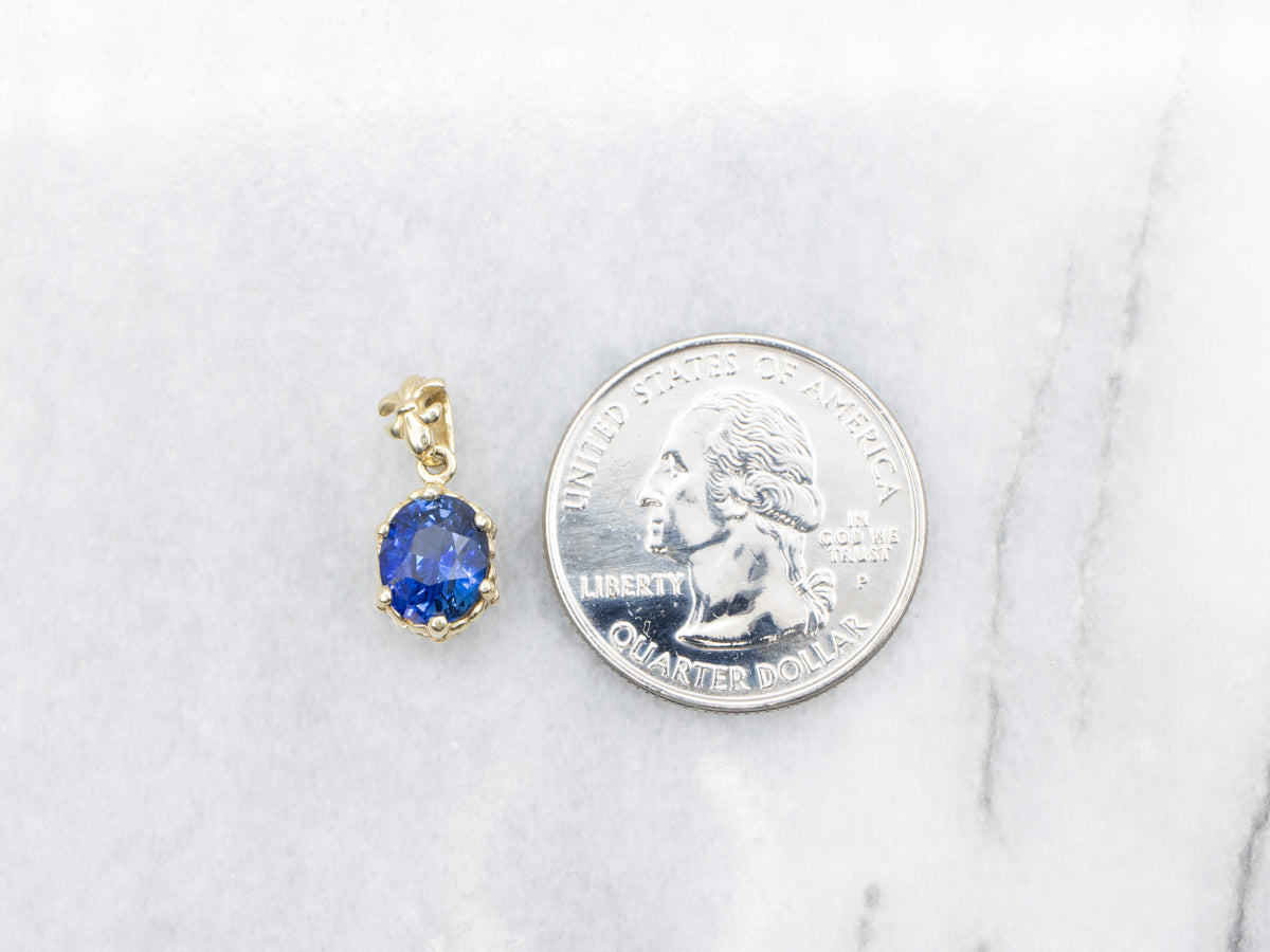 Fleur De Lis Blue Sapphire Solitaire Pendant