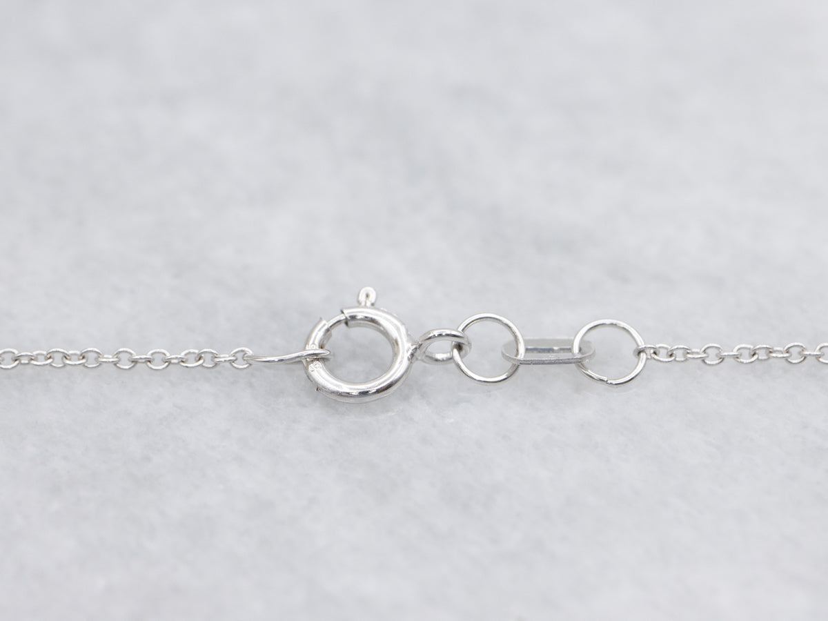 Modern Sapphire and Diamond Halo Pendant on Cable Chain